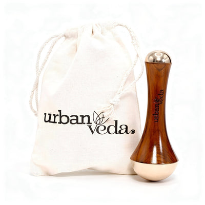 Urban Veda Kansa wand with a wooden handle and its cotton storage bag